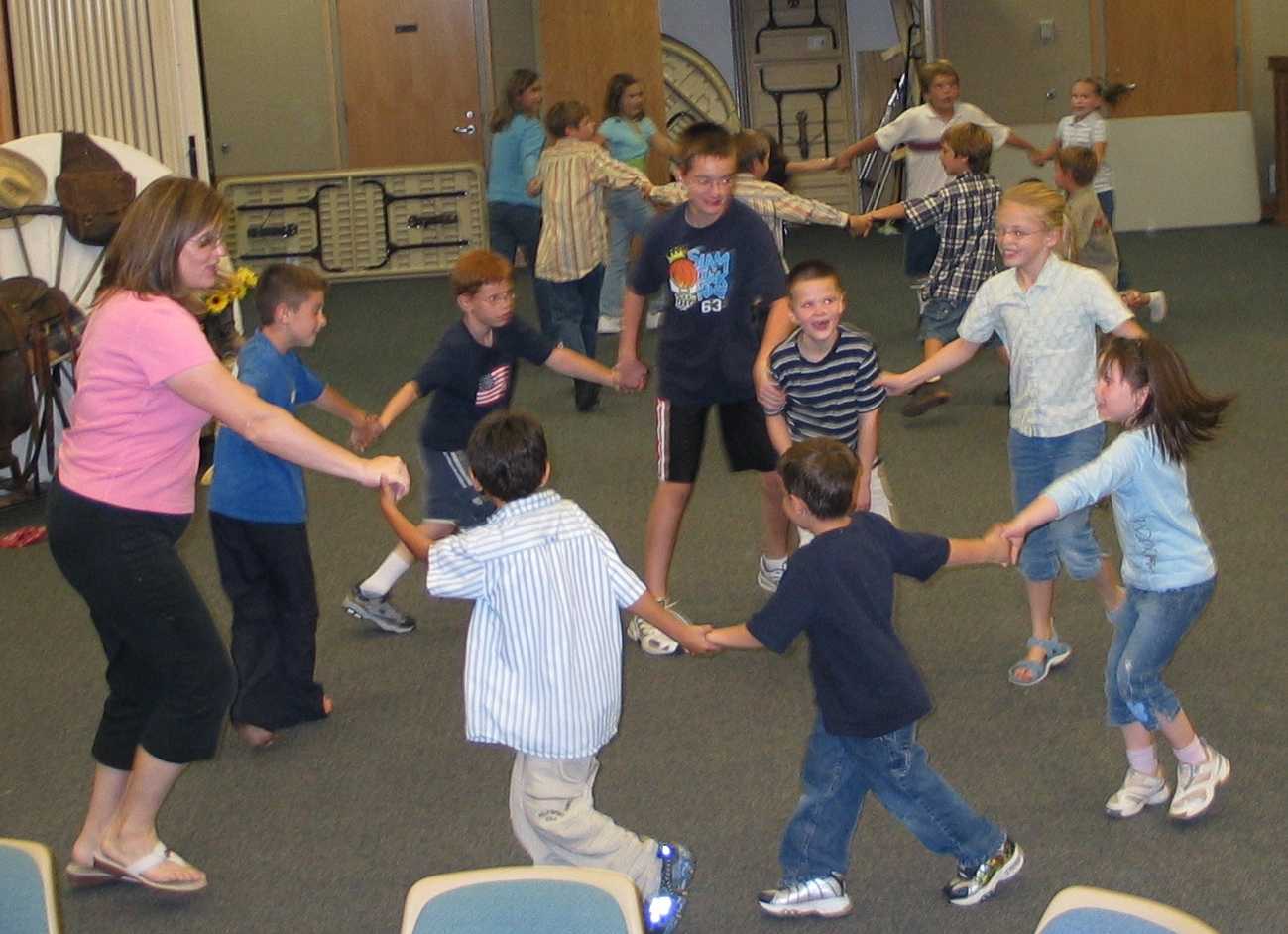 Brown children play games during Reunion