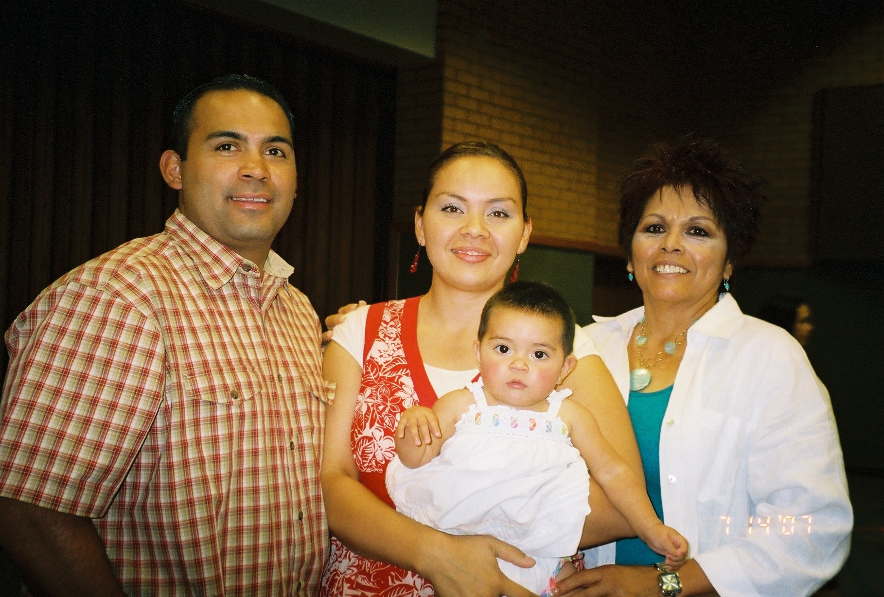 Joel Martinez, Jessica and Naomi, with mom Millie Brown