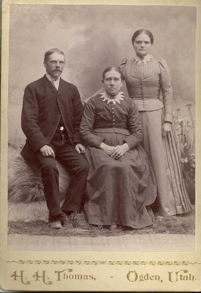 Possibly Calvin Brown, his mother-in-law Christina Anderson Haggstrom,and Calvin's fiancee or wife, Emma.