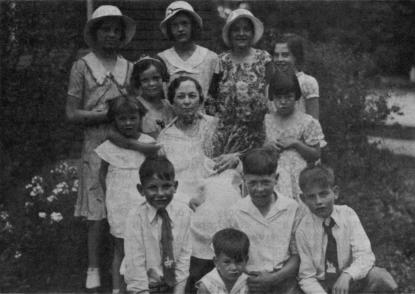 Sarah Jane Fife White surrounded by her grandchildren
