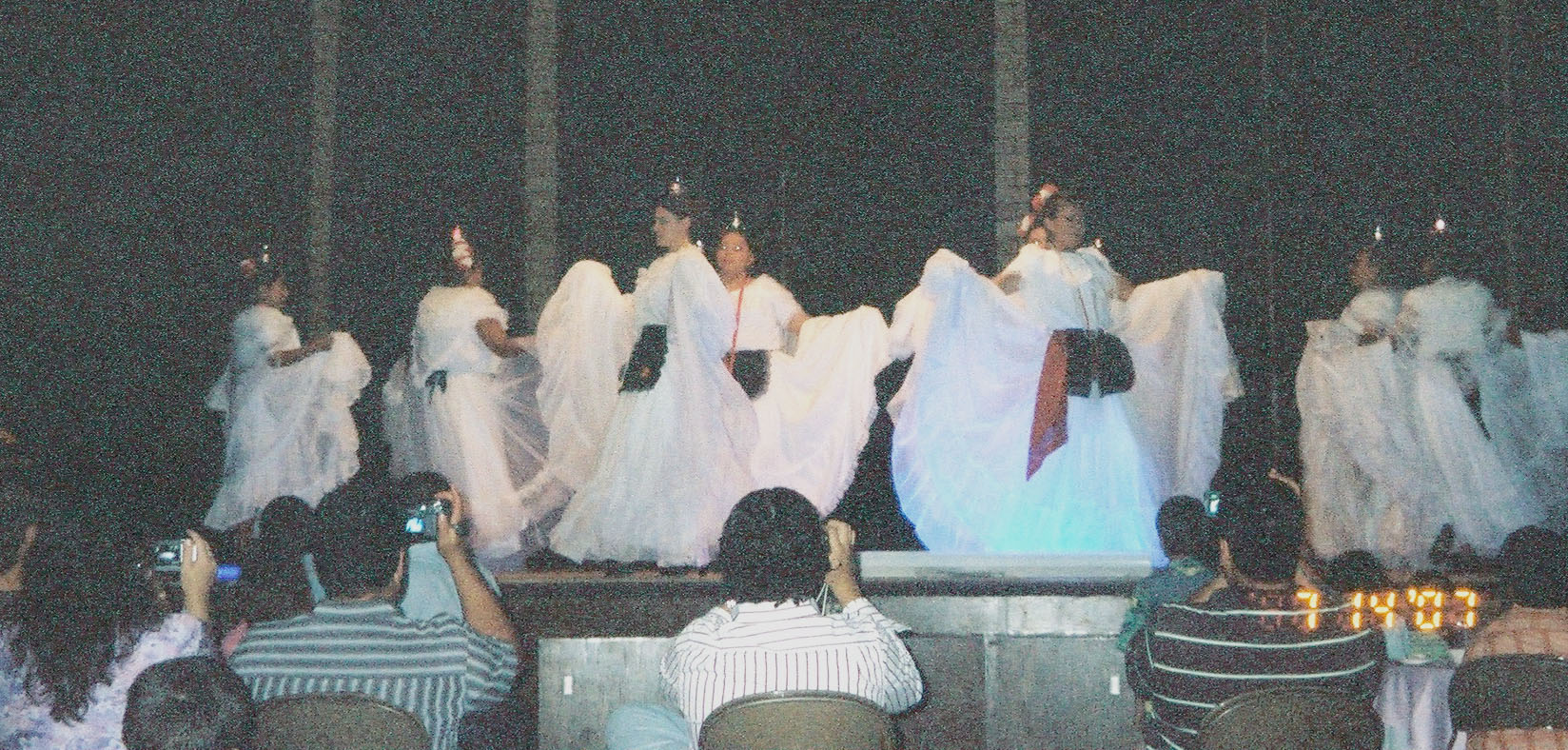 dancers in white dresses